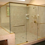 l showerdoor with brass header and u channels